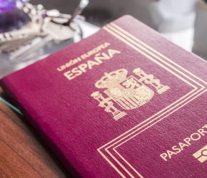 spanish-passport-next-to-keys-and-clock-on-a-table-2026-01-11-10-04-03-utc-scaled.jpg